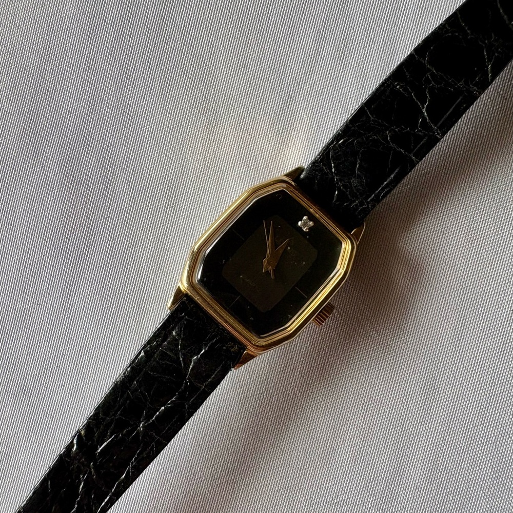 Vintage women’s Elegant Black and Gold Watch